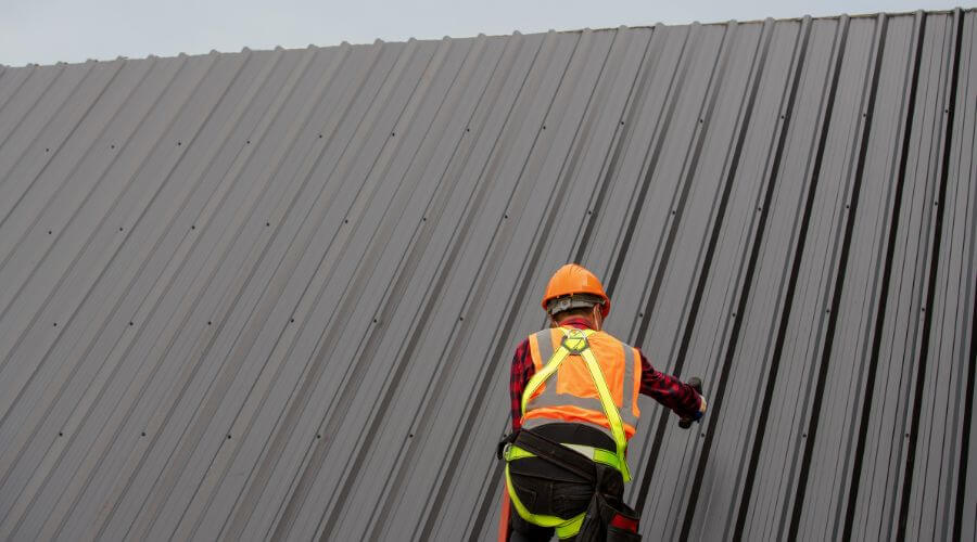 Professional metal roof installation services in Alto, MI